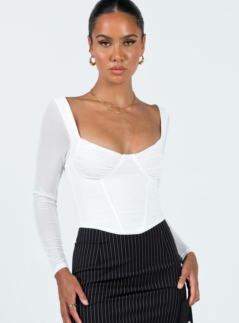 Front view of model wearing  front Princess Polly Full Sleeves Square Neck  Bruna Top Long Sleeve White