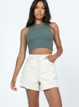 Front view of model wearing  front Elena Denim Shorts Cream Princess Polly High Waisted Shorts 