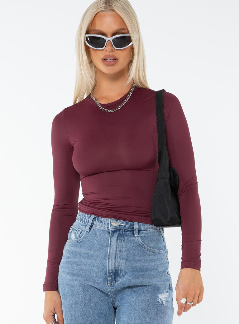 Front view of model wearing  front Princess Polly Full Sleeves Square Neck  Arnim Long Sleeve Top Wine