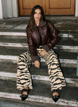 front view of model wearing Princess Polly Ramos Low Rise Jeans Tiger Low Rise Jeans 