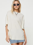 Front view of model wearing  front Princess Polly Half Sleeves V-Neck  Keep An Open Mind Oversized Tee White