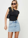 side view of model wearing Princess Polly Gazelle Denim Skort Light Wash High Waisted Shorts 