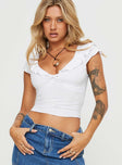 front view of model wearing Princess Polly Say Nothing Top White Short Sleeves Plunger 