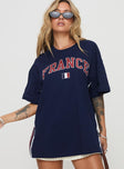 front view of model wearing Princess Polly Goal France Oversized Tee Blue Half Sleeves Crew Neck 