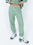 front view of model wearing Princess Polly Club Basic Trackpants Sage 