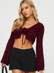 front view of model wearing Princess Polly Rosey Tie Up Long Sleeve Top Burgundy Full Sleeves V-Neck 