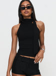 front view of model wearing Princess Polly Mathias Top Black Sleeveless High Neck 