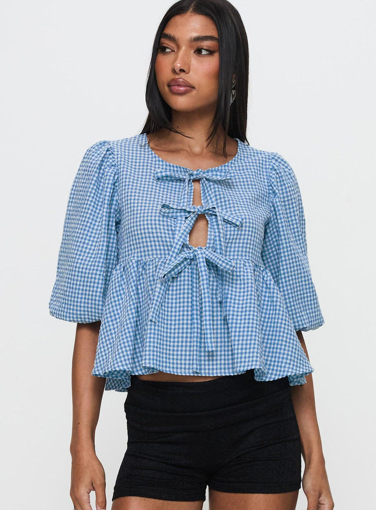 front view of model wearing Princess Polly Full House Tie Up Blouse Top Blue Plaid Half Sleeves Crew Neck 