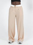 Front view of model wearing  front Princess Polly High Waisted Pants  Lacro Pants Beige