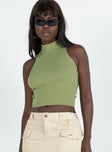 Front view of model wearing  front Princess Polly Sleeveless Square Neck  Torrington Top Green