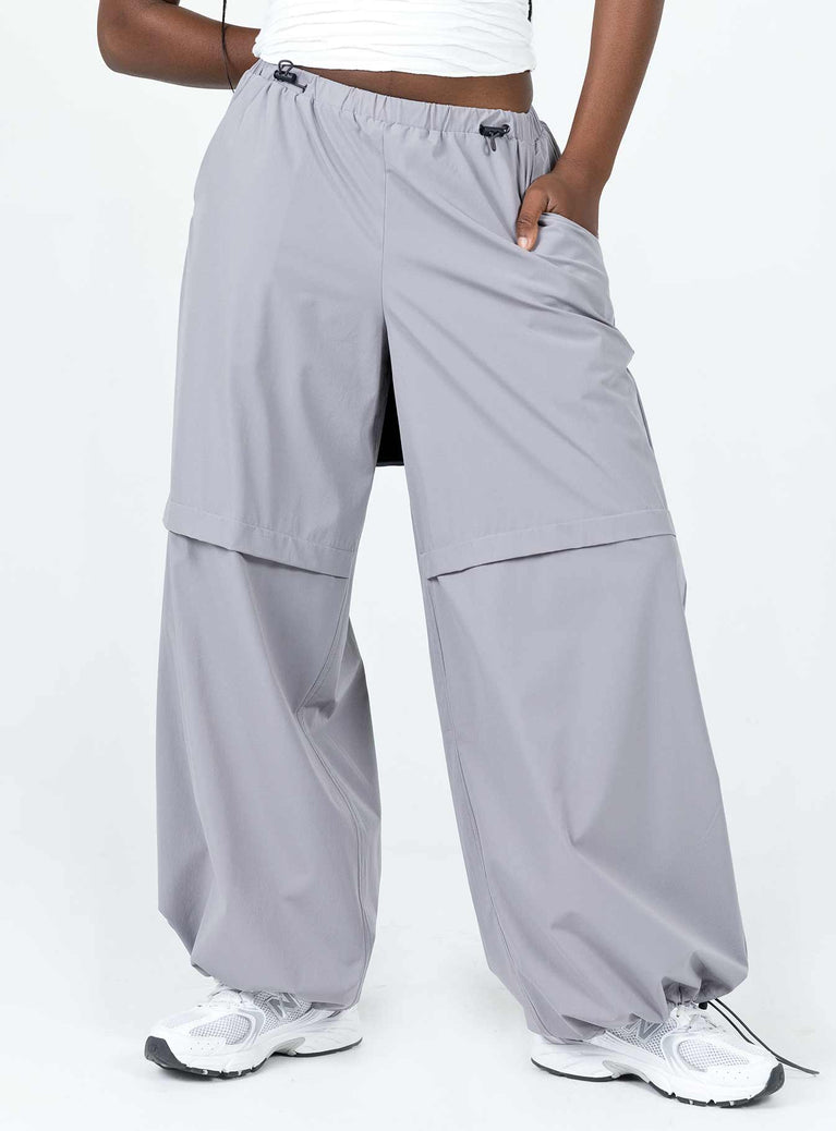 Front view of model wearing  front Princess Polly High Waisted Pants  Jason Parachute Pants Grey