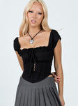 Front view of model wearing  front Princess Polly Short Sleeves Square Neck  Malany Corset Top Black