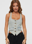 front view of model wearing Princess Polly Nyc Denim Halter Top Light Wash Sleeveless Scoop Neck 