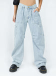 side view of model wearing Princess Polly Miami Vice Pants Denim Blue Mid Rise 