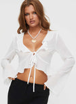 front view of model wearing Princess Polly Gylda Long Sleeve Top White Full Sleeves Plunger 