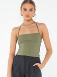 Front view of model wearing  front Princess Polly Sleeveless Square Neck  Halt It Top Green