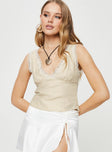 Front view of model wearing  front Princess Polly Sleeveless Plunger  Whinnie Top Cream