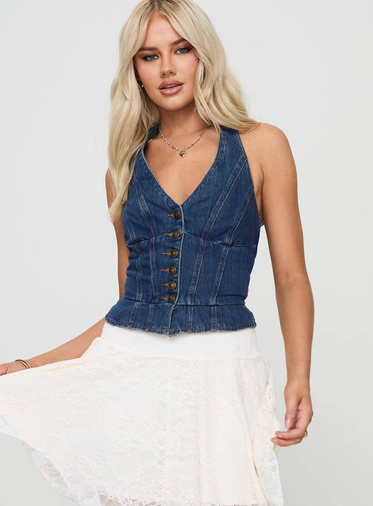 front view of model wearing Princess Polly Yukiyo Denim Top Mid Wash Sleeveless V-Neck 