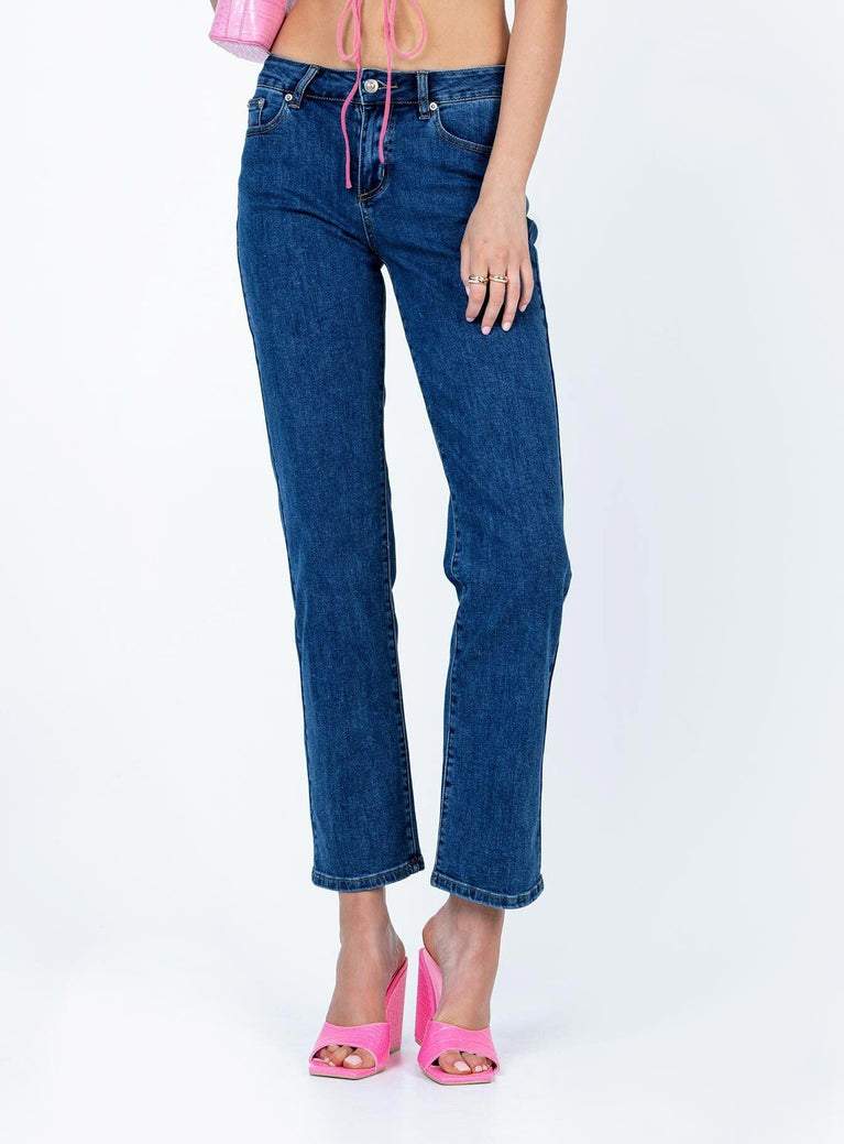 Front view of model wearing  front Princess Polly Mid Rise  Rhye Low Rise Jeans Mid Wash Denim