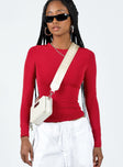 Front view of model wearing  front Princess Polly Full Sleeves Square Neck  Arnim Long Sleeve Top Red