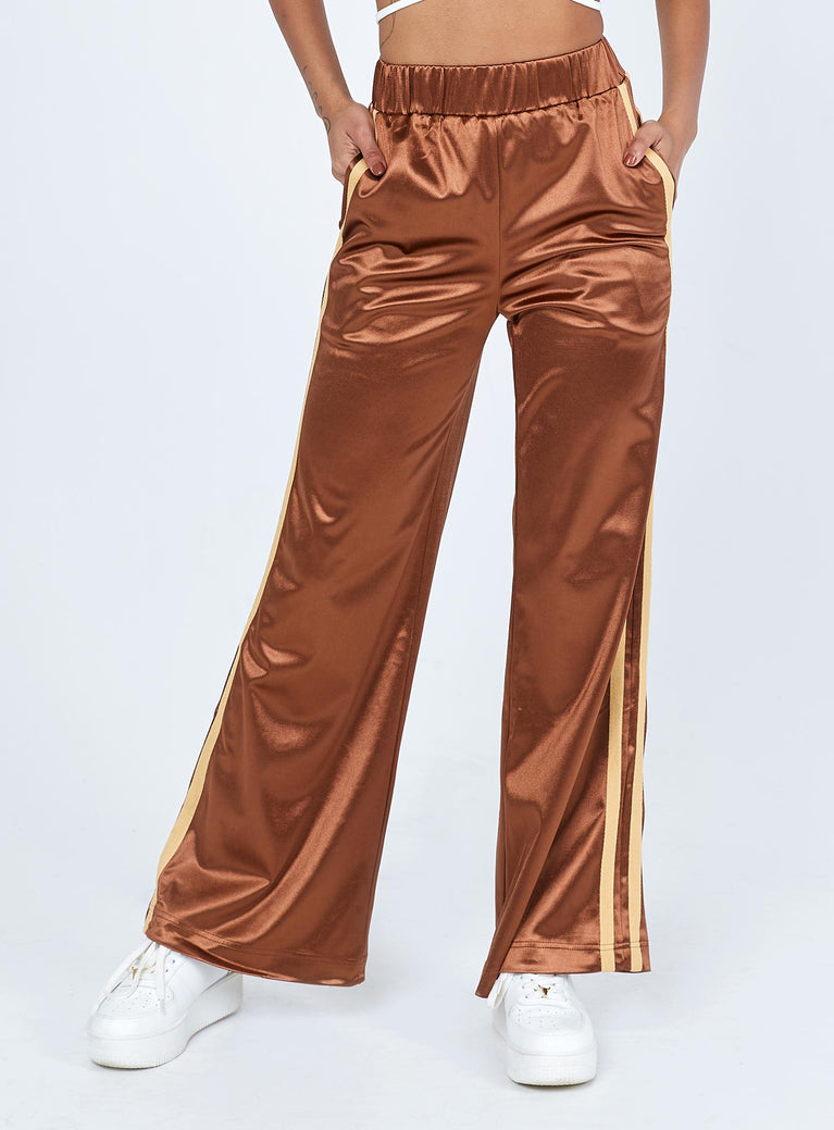 front view of model wearing Princess Polly Dave Trackpants Brown 