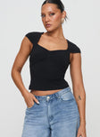 front view of model wearing Princess Polly Gatler Top Black Sleeveless V-Neck 