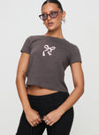 front view of model wearing Princess Polly Polly Bow Tee Charcoal Short Sleeves Crew Neck 