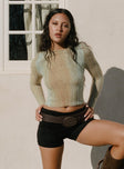 front view of model wearing Princess Polly Cardenas Long Sleeve Top Green Full Sleeves Crew Neck 