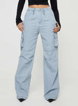 Front view of model wearing  front Princess Polly Mid Rise  Paige Mid Rise Cargo Jean Light Wash