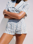 side view of model wearing Princess Polly Tucked In Lounge Short Blue Stripe High Waisted Shorts 