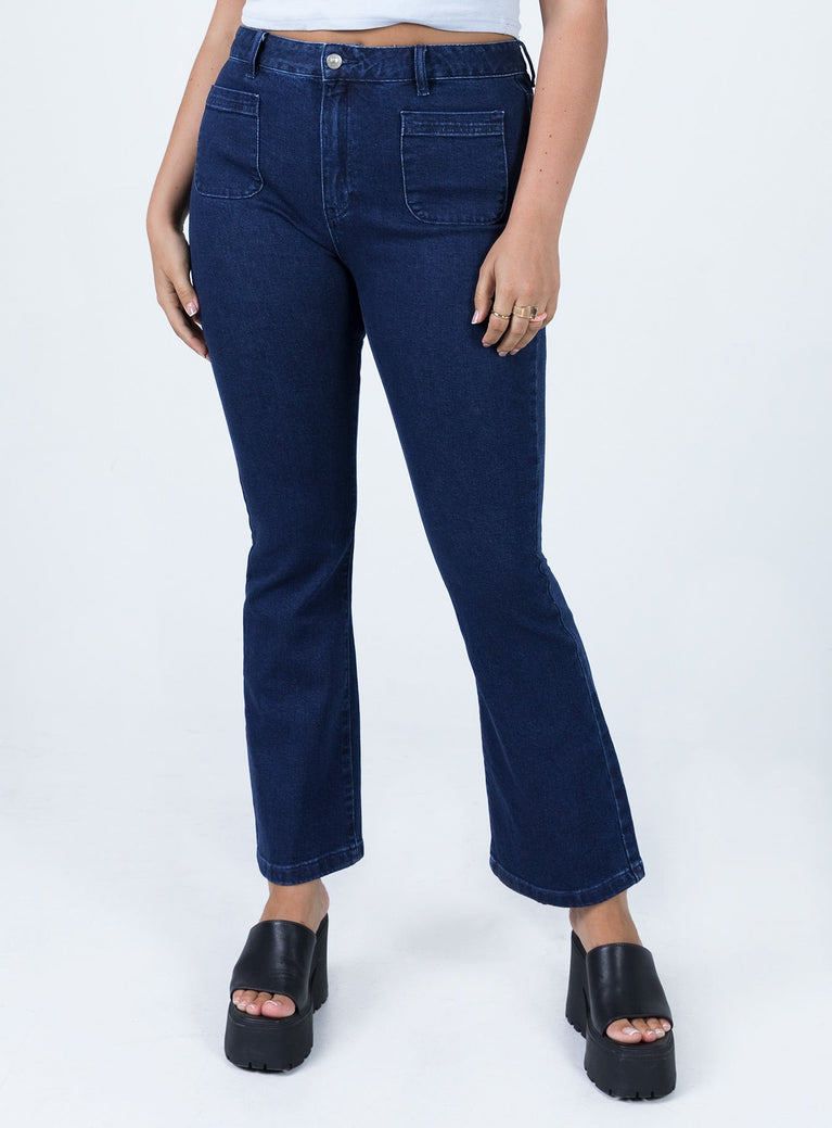 front view of model wearing Princess Polly Dalta Mid Rise Flare Denim Jeans Mid Rise 