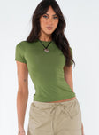 Front view of model wearing  front Princess Polly Short Sleeves High Neck  Lowell Top Olive