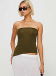 Strapless top Elasticated band at bust, asymmetric hem, split at side Good stretch, unlined 