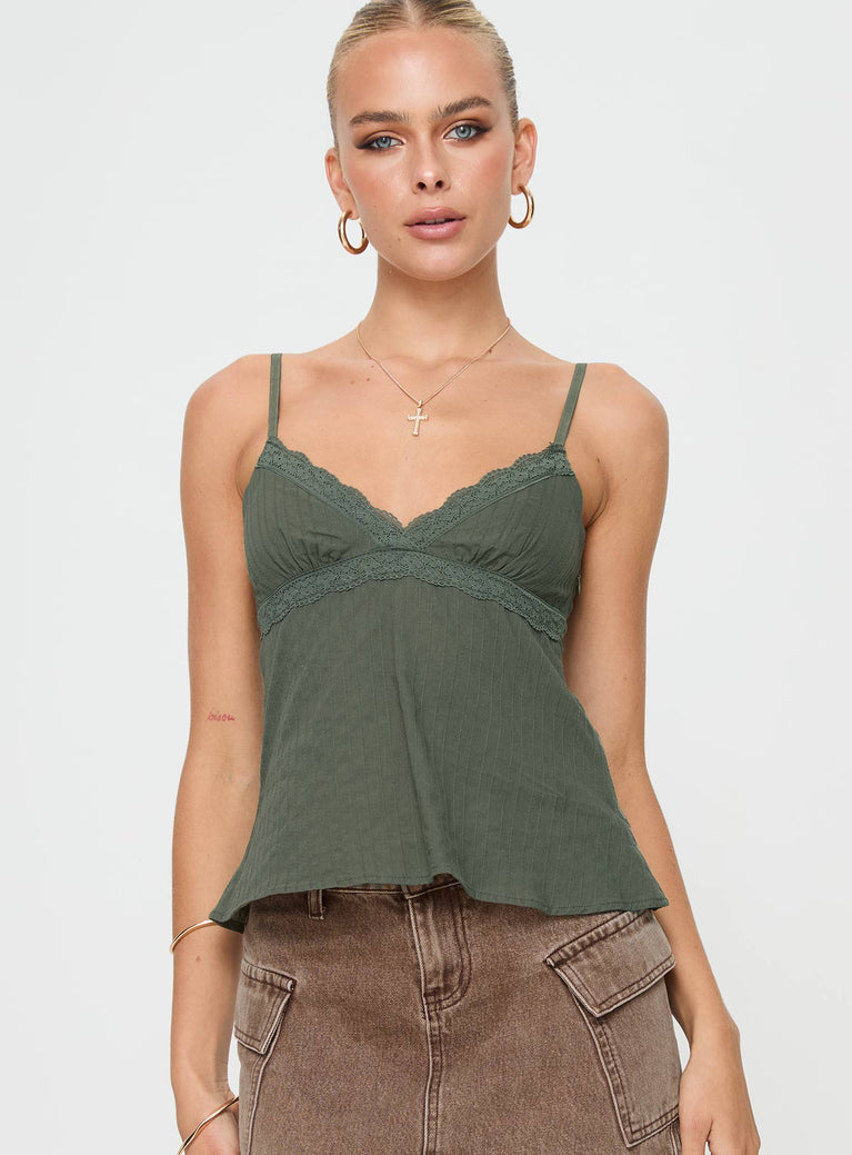 front view of model wearing Princess Polly Lunya Top Green Sleeveless V-Neck 