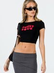 Front view of model wearing  front Princess Polly Short Sleeves Square Neck  Sweet N Sour Tee Black / Red