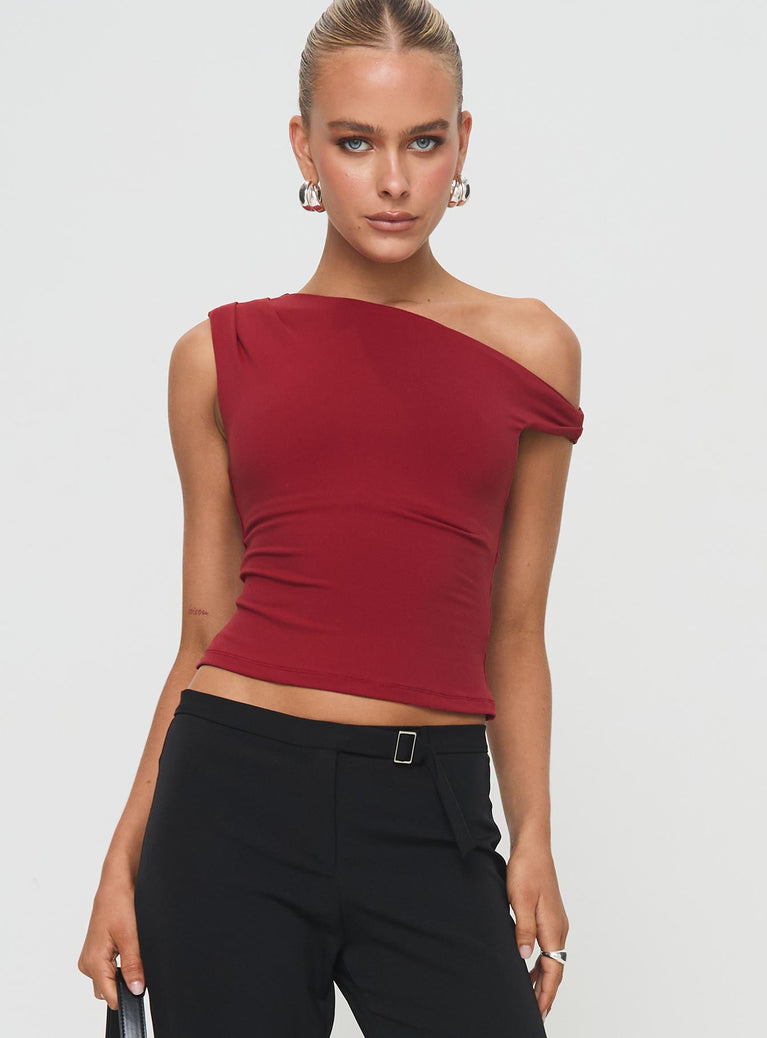 front view of model wearing Princess Polly Danza Top Red Sleeveless Asymmetric Neckline 