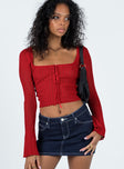 Front view of model wearing  front Princess Polly Full Sleeves Square Neck  Mellow Long Sleeve Top Red