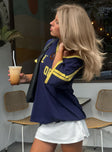 back view of model wearing Princess Polly Spectate Tee Navy Half Sleeves V-Neck 