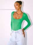 front view of model wearing Princess Polly Crosby Long Sleeve Bodysuit Green Full Sleeves Scoop Neck 