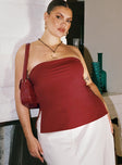 side view of model wearing Princess Polly Strutter Strapless Top Burgundy Curve Sleeveless Square Neck 