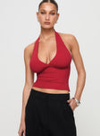 front view of model wearing Princess Polly Whimsy Halter Top Red Sleeveless Plunger 