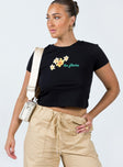 Front view of model wearing  front Princess Polly Short Sleeves High Neck  Le Fleurs Top Black