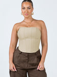 Front view of model wearing  front Princess Polly Sleeveless Square Neck  Harnett Corset Top Beige