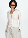 front view of model wearing Princess Polly Elingford Zip Up Hooded Sweater Cream Cropped 