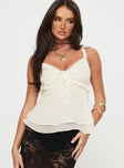 front view of model wearing Princess Polly Taini Top Cream Sleeveless Plunger 