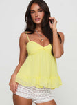 side view of model wearing Princess Polly Barbier Top Yellow Sleeveless Sweetheart 