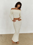   side view of model wearing Princess Polly Snuggle Boucle Maxi Skirt Cream Maxi 