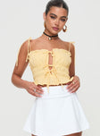 back view of model wearing Princess Polly Sars Top Yellow Sleeveless Square Neck 