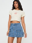   front view of model wearing Princess Polly Chillders Denim Mini Skirt Mid Wash Petite Mini Skirts 