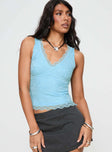 front view of model wearing Princess Polly Far Away Top Blue Sleeveless V-Neck 